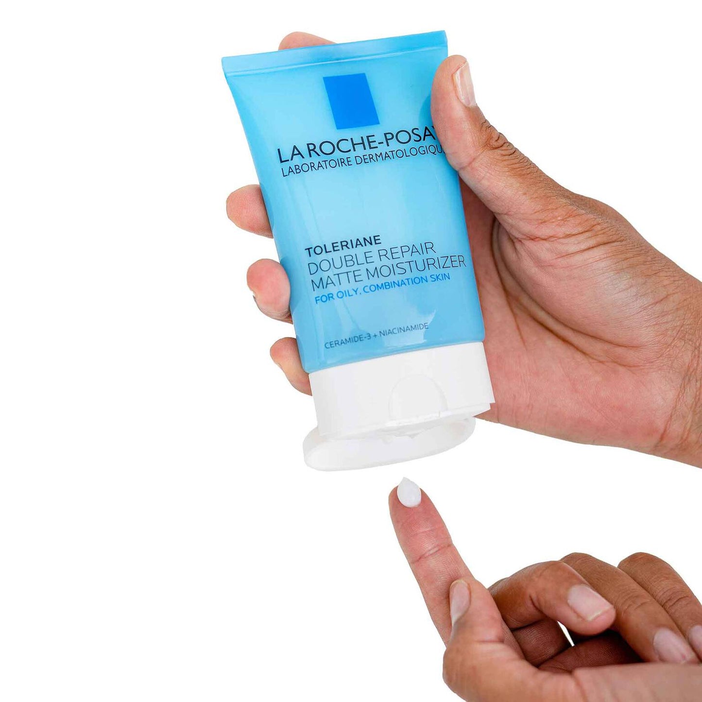toleriane-double-repair-matte-face-moisturizer-for-oily-skin-b5 la-roche-posay-toleriane-matte-lotion-on-finger.jpg